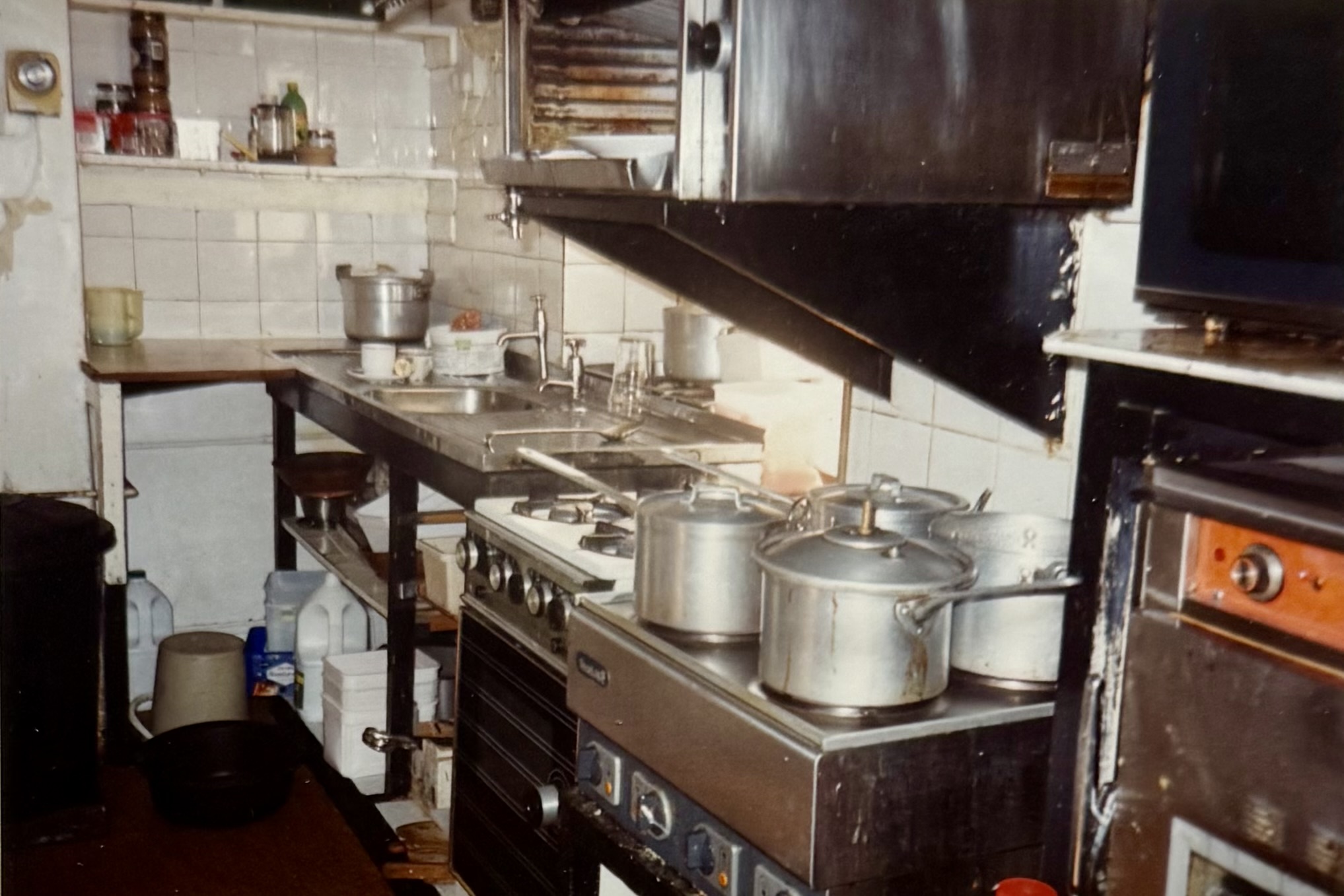 The kitchen, which was located around where the Snug is on the Bar side.