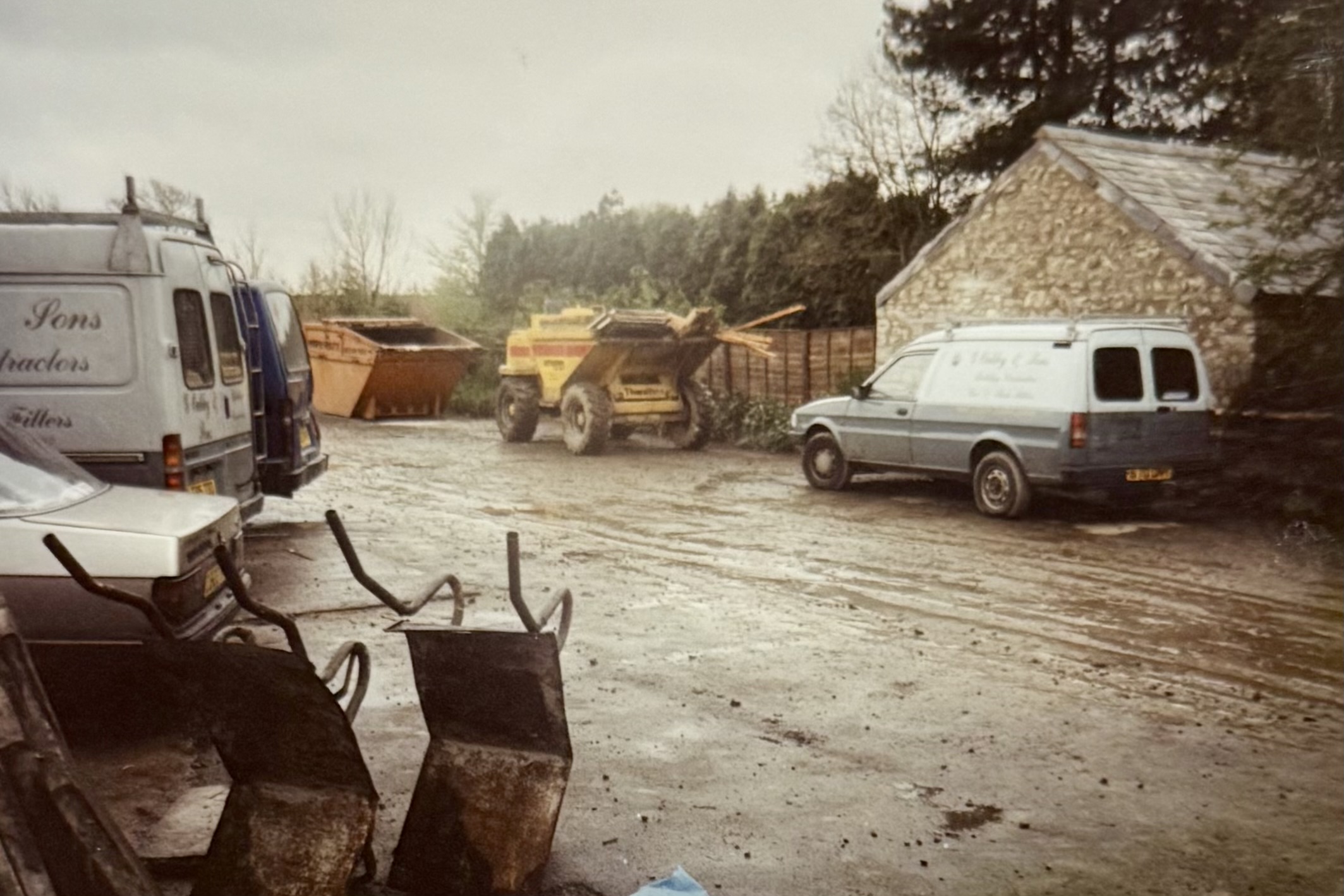 Around where the Function Room doors now stand, construction vehicles and a skip can be seen in the car park.