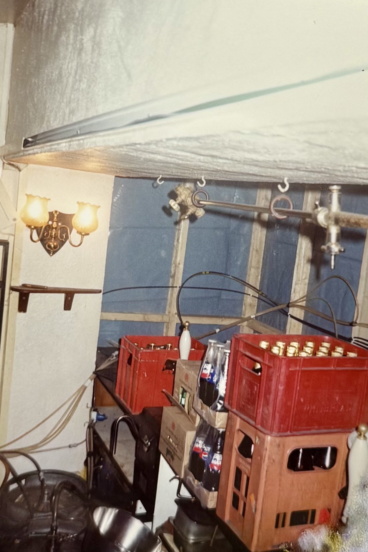 A temporary cellar area located on the Lounge-side bar, most likely during the renovations as there's a wall set up to cordon off the area.