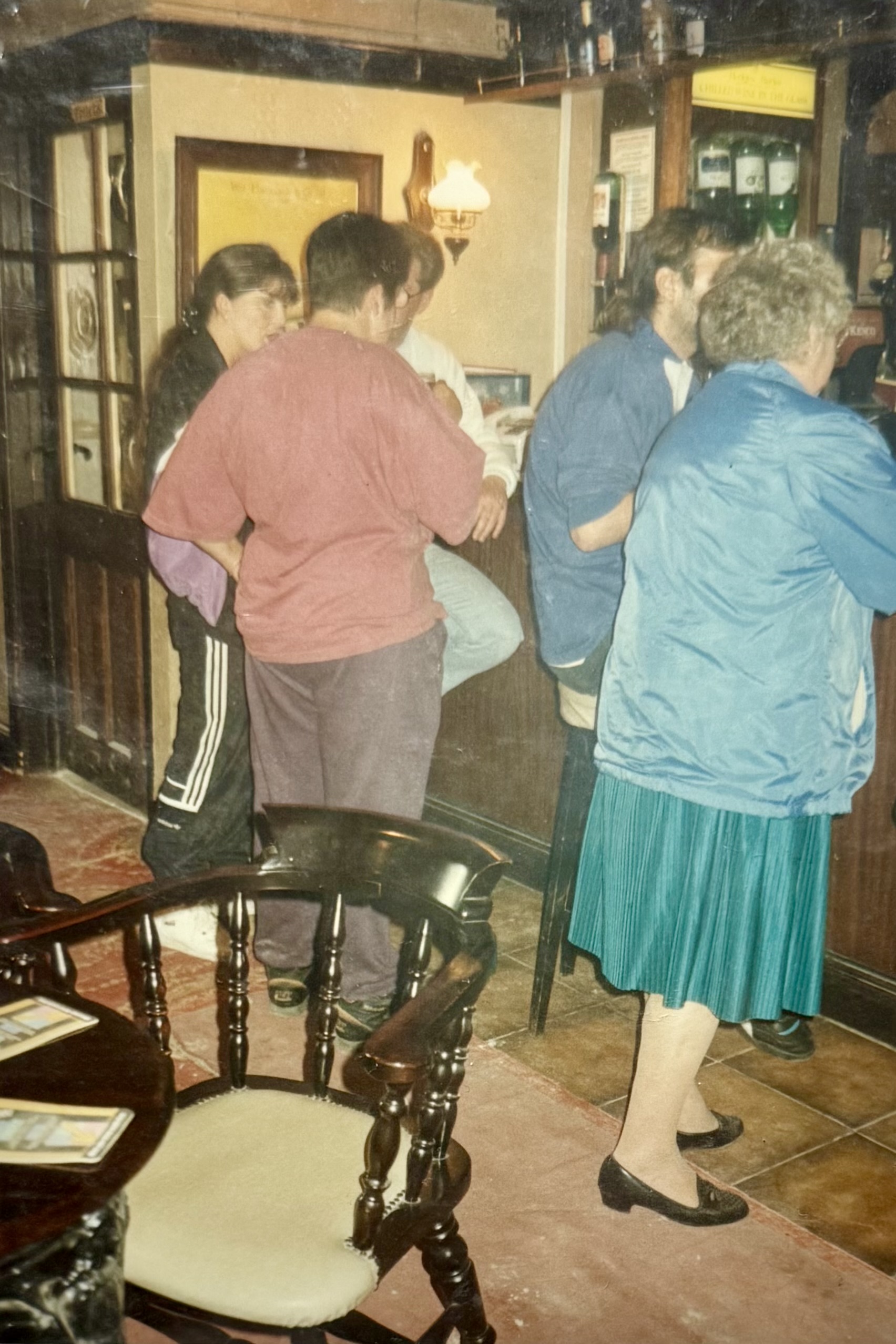 Taken from the Bar area, showing people standing at the bar. You can see the Druids frame behind the people, as well as a light fitting on the wall which is no longer there.