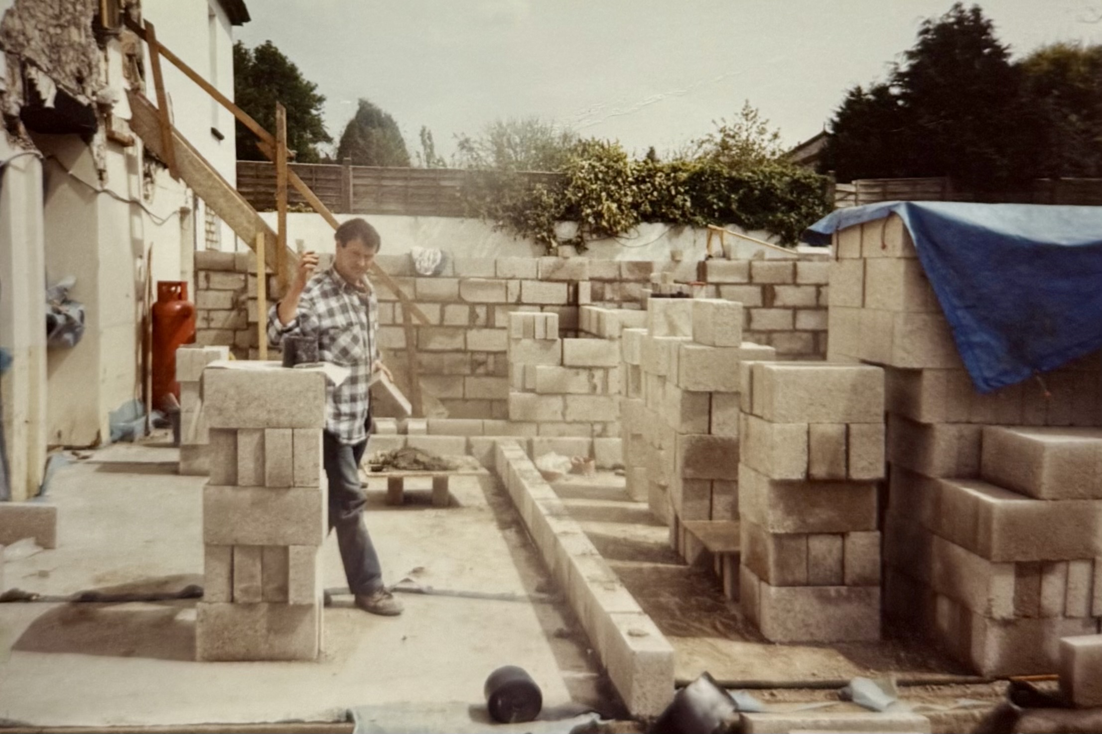 During construction at the back of the pub. You can see some stairs which would later become the stairs leading up to the accommodation above the pub. Originally, the stairs were from the front porch, and went up through the middle of the two sides of the bar.