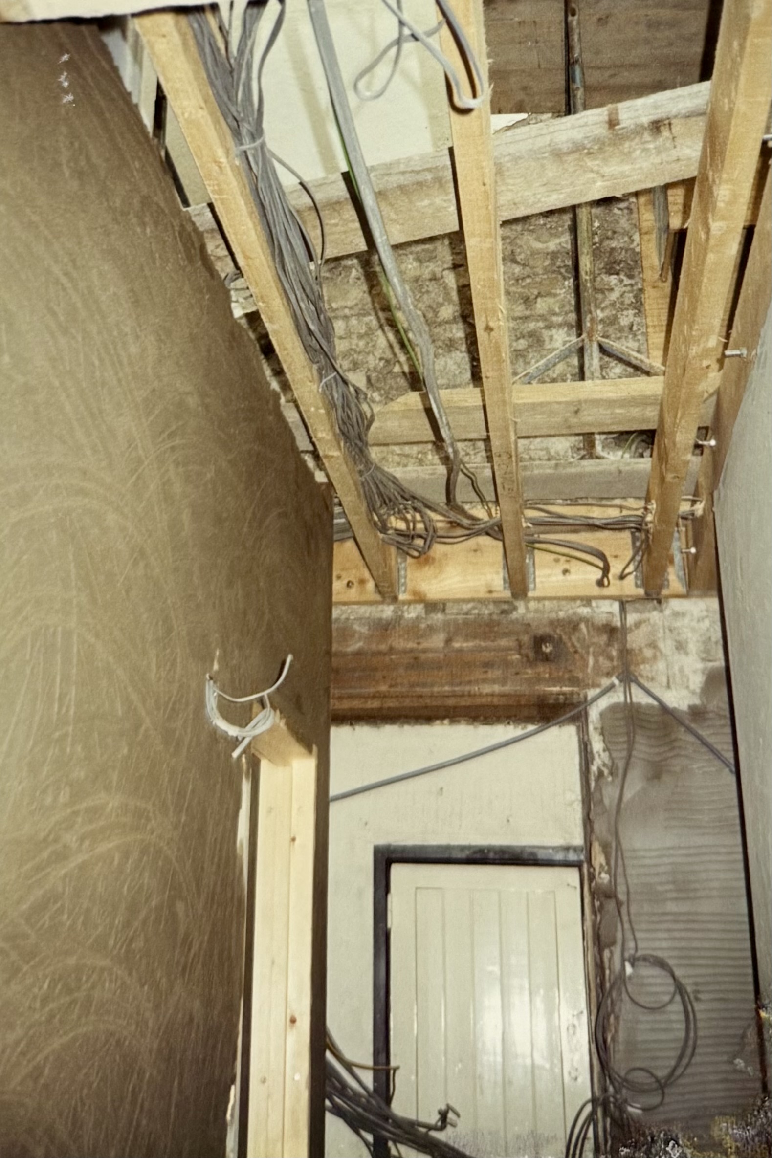 Two doorways and lots of wiring. Location unclear.