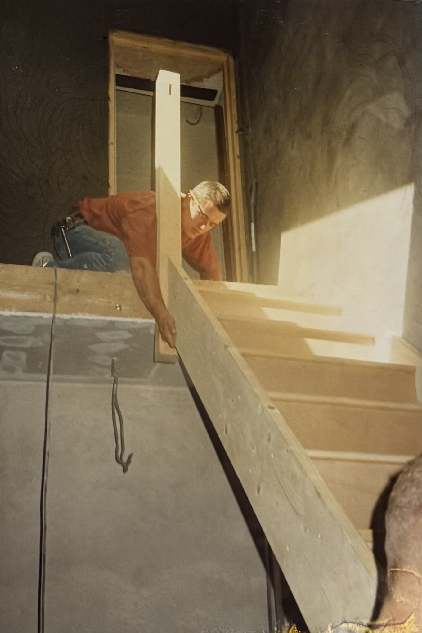 The stairs being fitted, which lead to the upstairs accommodation above the pub.