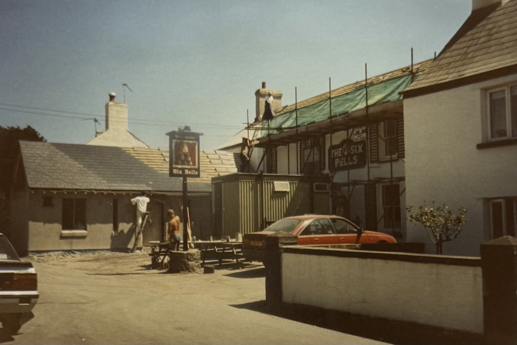 The pub from the front, towards the end of the renovations. The old sign is still there, and the roof and Restaurant area not yet finished.