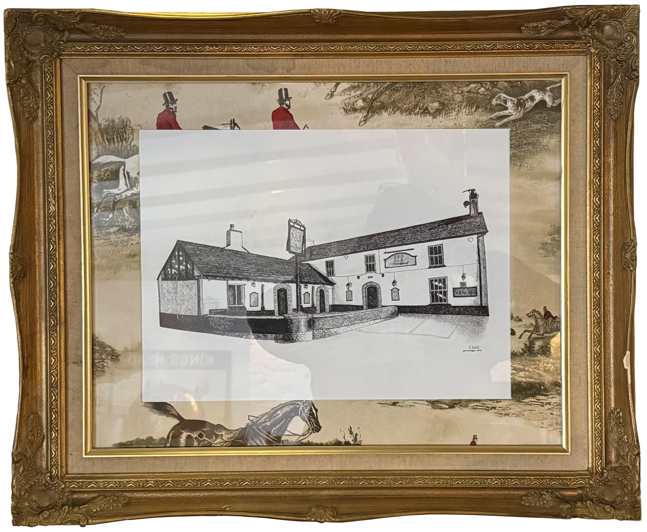 A drawing of the Six Bells pub, with hunting style wall paper around the edge, in a gold ornate frame.